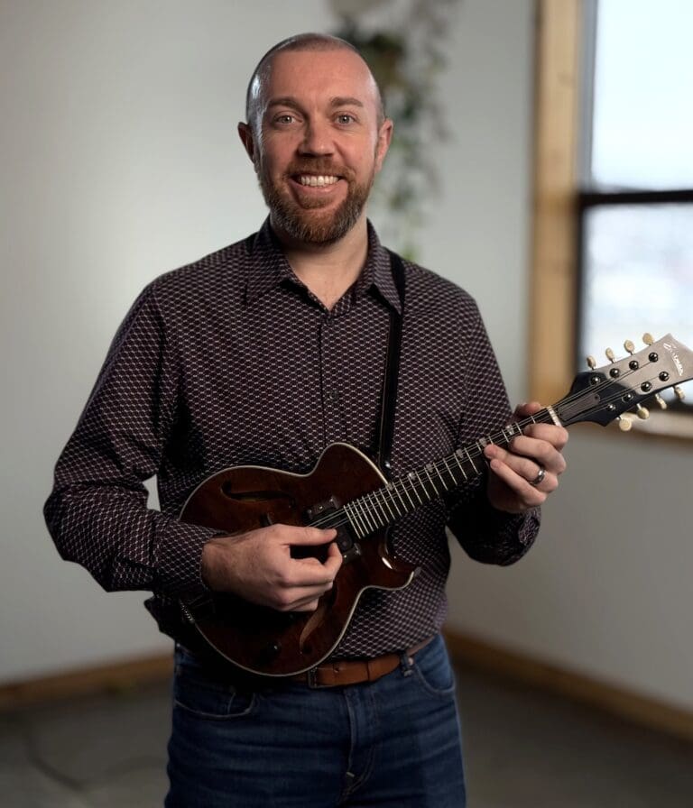 Rowan Sherlock originally hails from Waterford, Ireland, having moved to Newfoundland in 2017 after coming to NL on tour with a band from Ireland, aptly named ‘Newfoundland’! Now a Canadian citizen - currently a full-time music teacher and gigging musician. He plays mandolin, piano and fiddle for the group, as well working as regular gigging fiddle player for ‘Rugged Shores’ and as a side musician for others too. Rowan has a BA in Music Composition and Classical Violin performance and completed his Masters Degree in Music Composition, from Ireland. Rowan has since toured the world extensively with many orchestras and groups, before making Newfoundland his home, residing in tropical Conception Bay South.